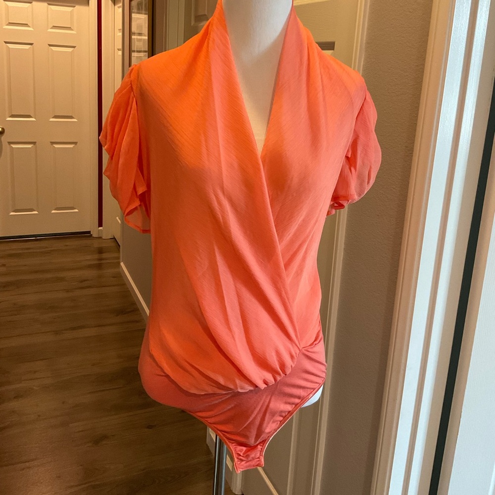 Orange bodysuit style blouse